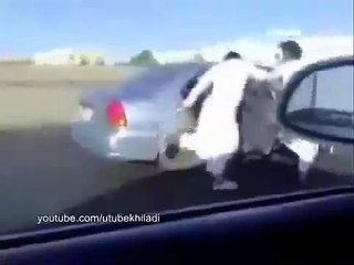 Saudi boy racers 'skate' out of car doors