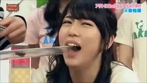 girls put their mouth on a pipe and blow to win this japanese game show