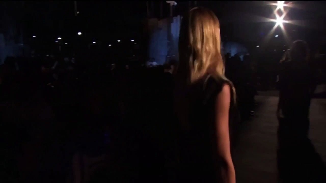 Models Candice Swanepoel & Pooja Mor fall down during Givenchy Spring/Summer 2016 fashion show