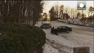 Out of control cars crash after skidding across icy road in Atlanta