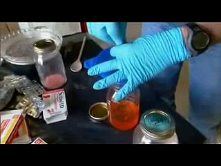 COP cooks METH.  Shows how easy it is.