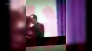 Teacher caught on camera kissing student...