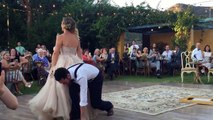 Bride puts a spell on her magician groom during first dance