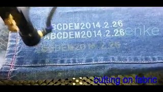 laser engraving cutting machine on jeans fabric leather paper ect