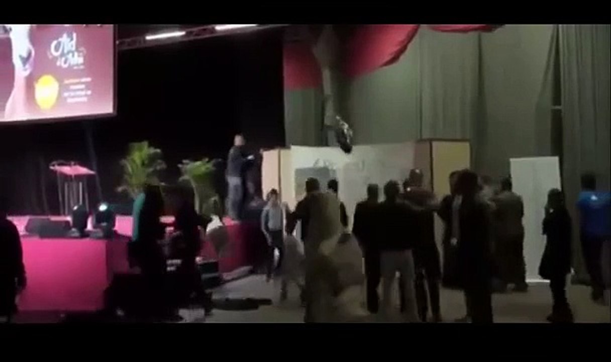 SHOCKING-VIDEO-TOPLESS-FEMEN-ACTIVIST-storm-stage-at-MUSLIM-CONFERENCE