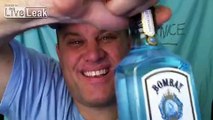 CRAZY DRUNK SLAMS BOTTLE OF BOMBAY GIN IN 10 SECONDS !