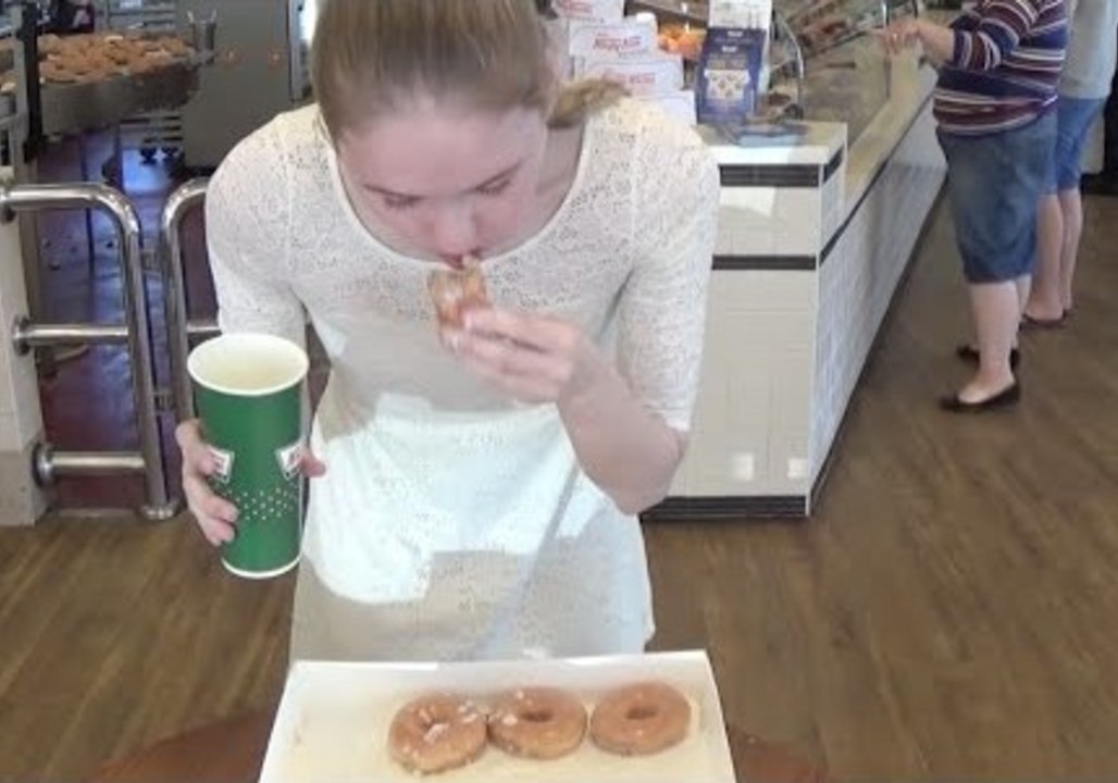 Model Devours a Dozen Donuts in 96 Seconds