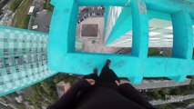 Watch Russian adrenaline junkies perform daring tricks atop a 40-story building