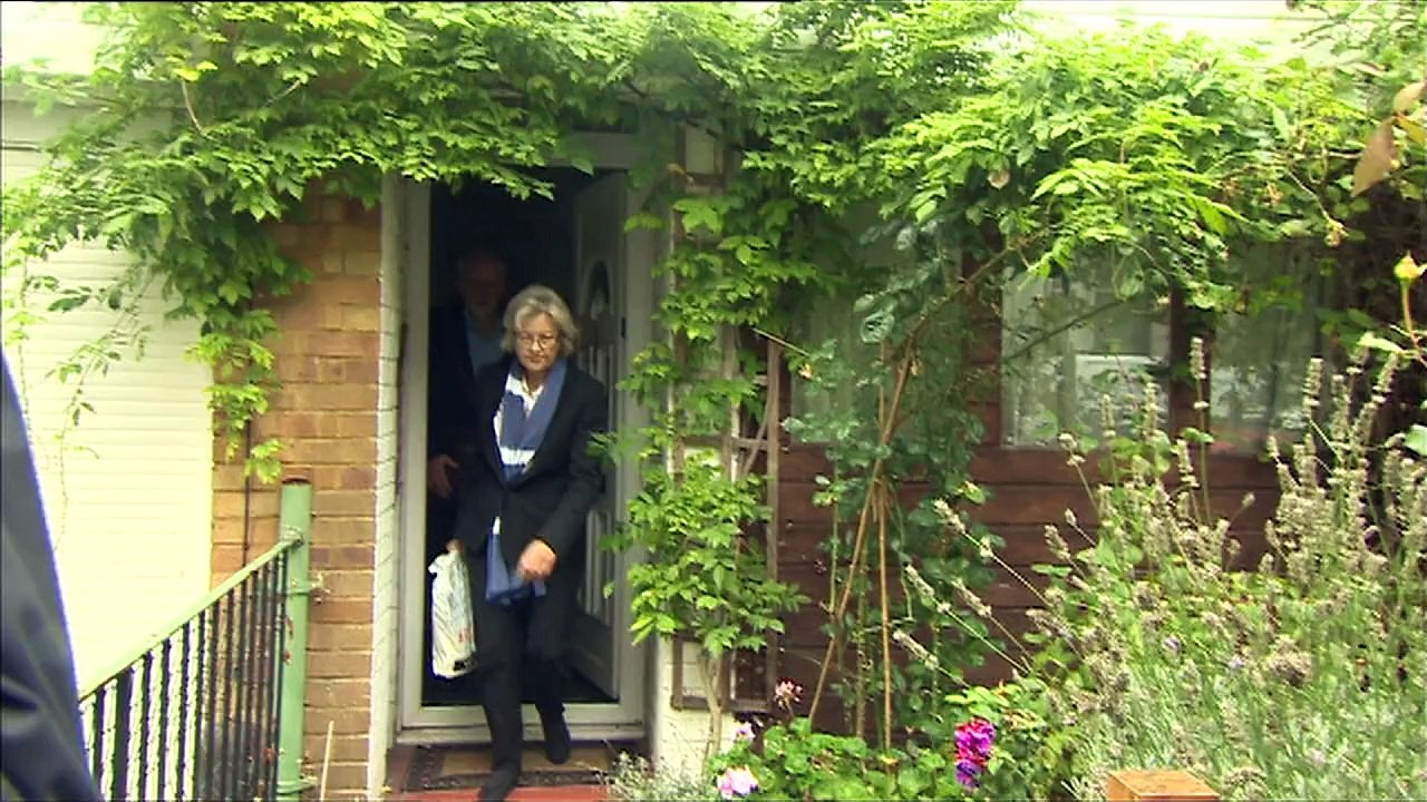 Corbyn's taxi driver knocks camera to the ground