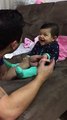 This baby should win an Oscar for pretending to cry when her dad cut her nails. _ Tune.pk