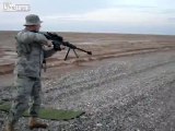 Shooting a Barrett .50 cal while standing.