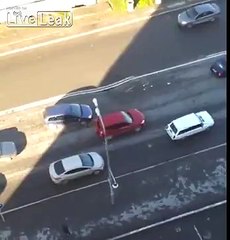 Large sinkhole appears in road, during traffic