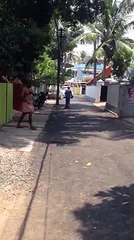 what is doing this man very funny