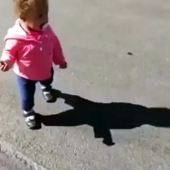 little girl scared of her shadow