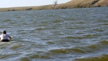 Myself enjoying swimming in (blue water) Nelson Carlson Lake of ND