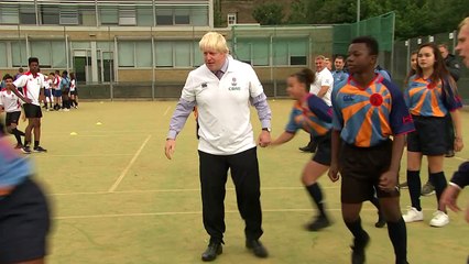 Boris Johnson plays rugby