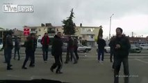 Strong winds rip roof of building onto parked car