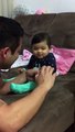 Adorable Baby Fakes Crying When Daddy Tries To Cut Her Fingernails