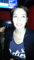 cute girl does something special with her lips.