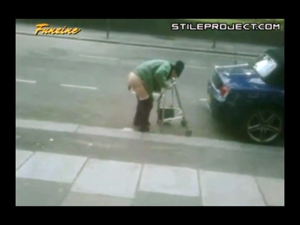 Granny shits on road