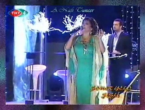 Belkıs AKKALE *Siyah Perçemini Dökmüş Yüzüne* (2)