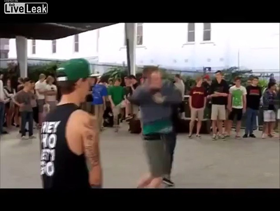 Guy gets kicked in the balls by dancing midget