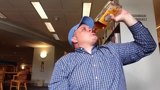 Stupid Guy drinks whole Bottle of Fireball Whiskey In Library