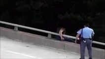 Cop Saves Suicidal Man on Edge of Bridge with a Big Hug in North Carolina (VIDEO)