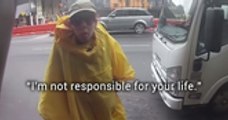 Biker Makes Eye Contact With This Raincoat Lady And This Happened
