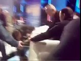 Ukrainian nationalist politicians wrestling in a TV studio