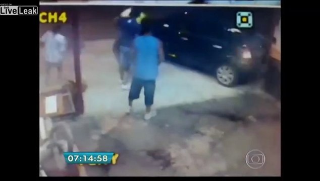 Guys fighting on a street. Narrow escape from being run over.