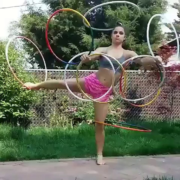 See how she spins 9 rings at the same time