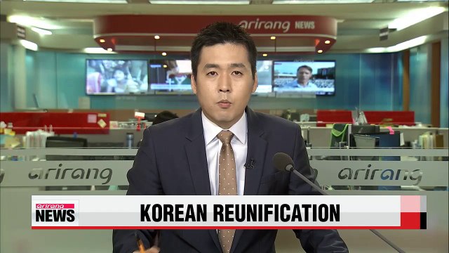 Unificaiton minister says Koreas need to work toward unification