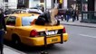 Muslim man praying in public on a taxi in New York