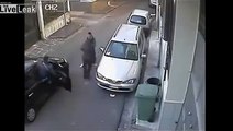 Two men robbing a woman caught on CCTV