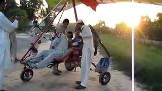 LiveLeak.com - Pakistani homemade glider with passengers