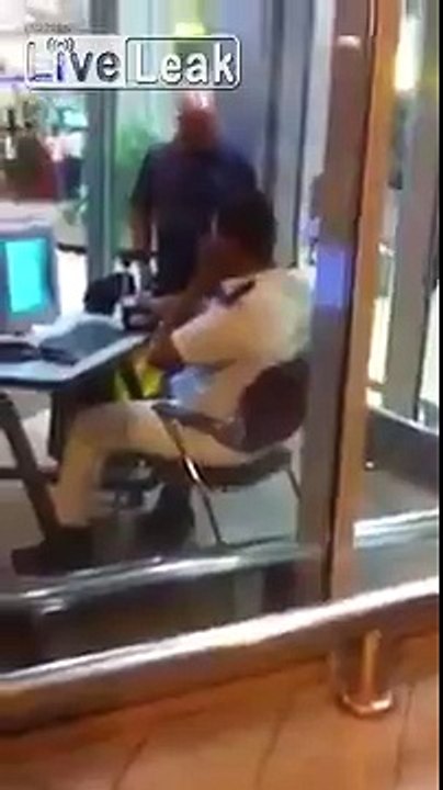 Cairo airport police while receiving a bribe from a passenger