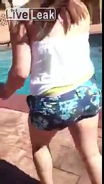 LiveLeak.com - Girl throws Cat in pool causing it to stress out and almost drown