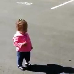 girl is scared by her shadow