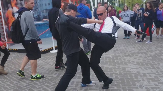 This street performer does what he calls Frozen Action Demo..