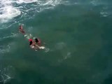 This brave lifeguard rescues three people