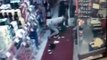 Man Robbing A Store Quickly Forgets about One of the Customers. Commits Big Mistake!