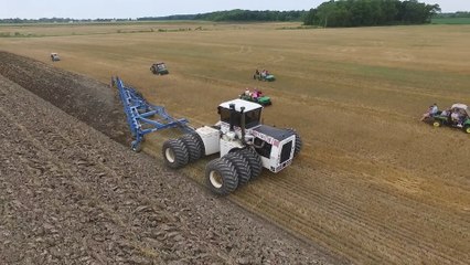 Big Bud with 21 bottom plow