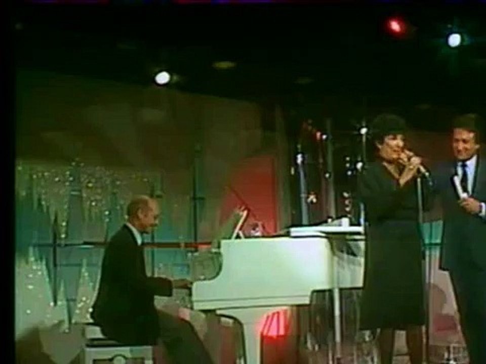 Micheline Dax siffle "Over the rainbow"