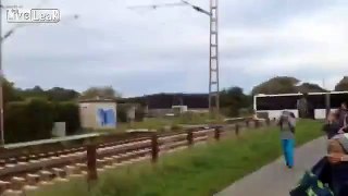 LiveLeak.com - Train crashes into school-bus at railroad crossing [Germany]