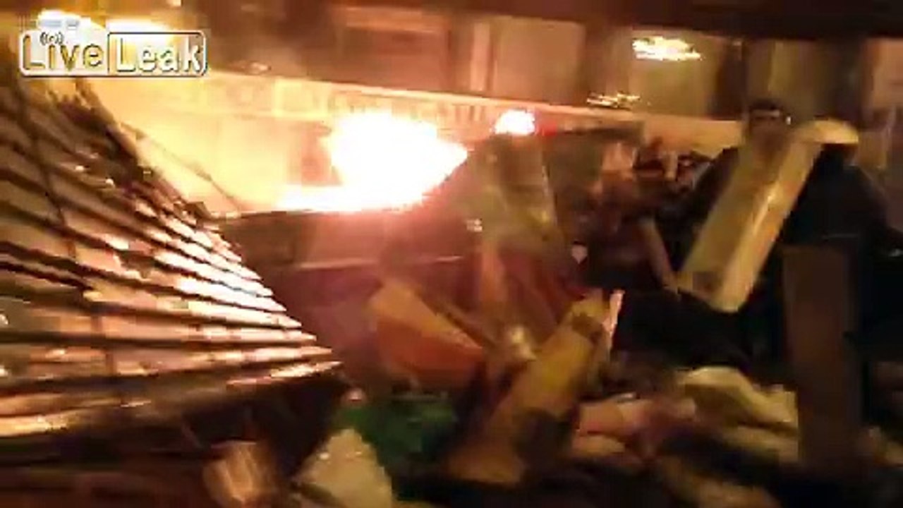 Kiev: Protesters destroyed 2 APCs (better angle)