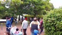 LiveLeak.com - Fight among migrants in a small German town. Sticks, stones and fists used.