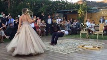 Bride puts a spell on her magician groom during first dance