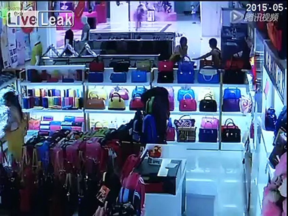 Kid Rides Escalator Handrail and Falls