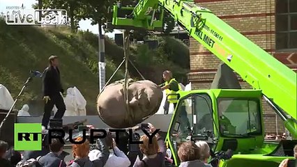 LiveLeak.com - Germany: Unearthed Lenin statue's head on display at Berlin exhibition